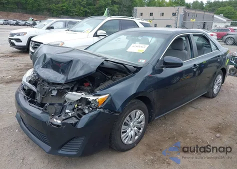 2014 Toyota Camry Le z USA, uszkodzony, nr VIN 4T4BF1FK1ER414475